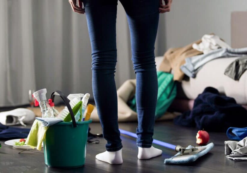 Woman horrified by mess left after party in her apartment, cleaning service, stock footage